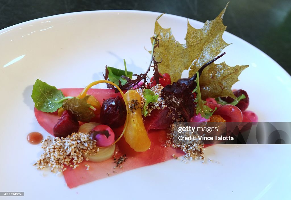 A dish from the menu with  deep fried and seasoned edible maple leaves at Canoe Restaurant