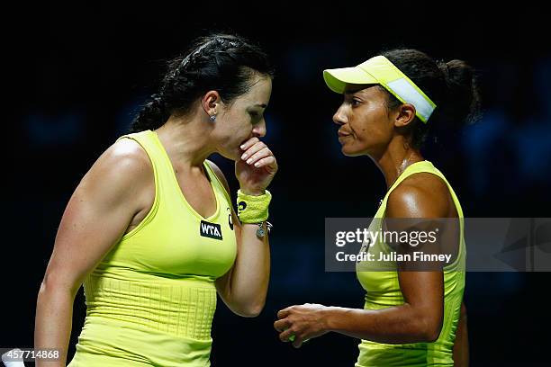 Raquel Kops-Jones of USA and Abigail Spears of USA talk tactics in the doubles quarter finals against Cara Black of Zimbabwe and Sania Mirza of India...