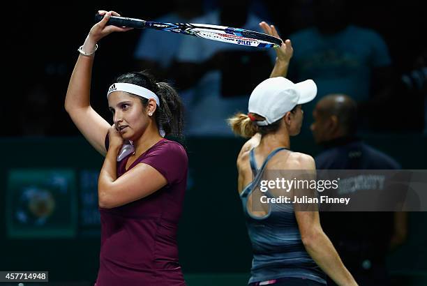 Cara Black of Zimbabwe and Sania Mirza of India celebrate defeating Raquel Kops-Jones of USA and Abigail Spears of USA in the doubles quarter finals...