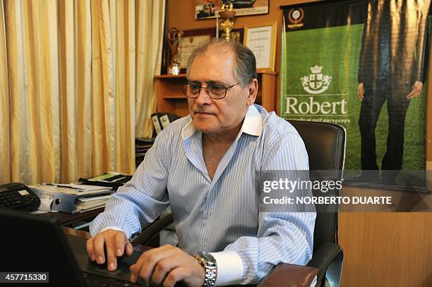 Roberto Espinola, owner of a chain of tailor shops in Paraguay, who launched a line of pocketless men suits to be worn as a protest against...