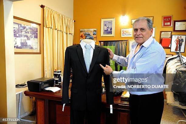 Roberto Espinola, owner of a chain of tailor shops in Paraguay, who launched a line of pocketless men suits to be worn as a protest against...