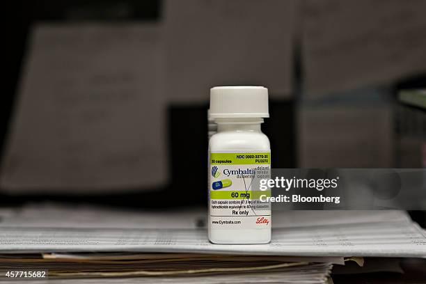 Bottle of Eli Lilly & Co. Cymbalta brand medication is arranged for a photograph in Princeton, Illinois, U.S., on Wednesday, Oct. 22, 2014. Eli Lilly...