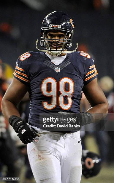 Corey Wootton of the Chicago Bears leaves the field after the game against the Dallas Cowboys on December 9, 2013 at Soldier Field in Chicago,...