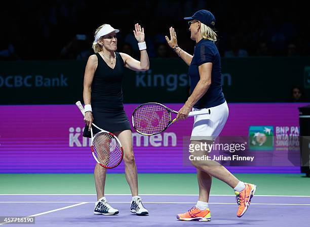 Tracy Austin and Martina Navratilova of USA in their legends match against Marion Bartoli of France and Iva Majoli of Croatia during day four of the...