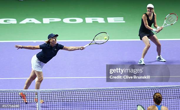 Martina Navratilova and Tracy Austin of the United States in action against Marion Bartoli of France and Iva Majoli of Croatia in the WTA Legends...