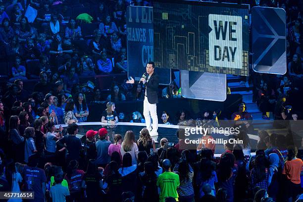 Actor Donnie Yen speaks at "We Day Vancouver" at Rogers Arena on October 22, 2014 in Vancouver, Canada.
