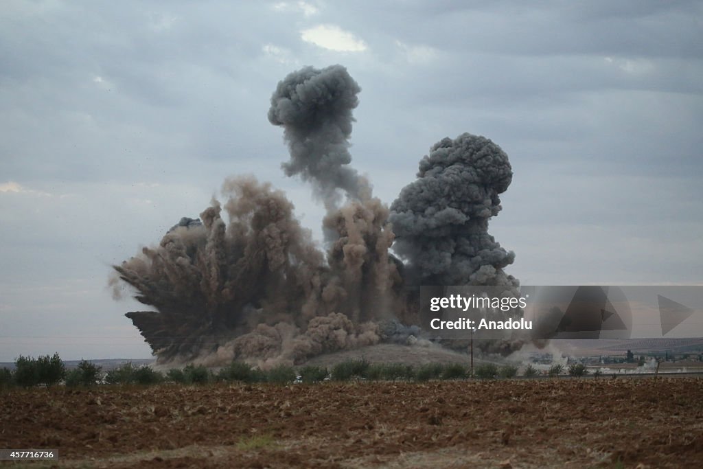 Smoke rises from Till Seir Hill in Kobani following US-led coalition airstrikes