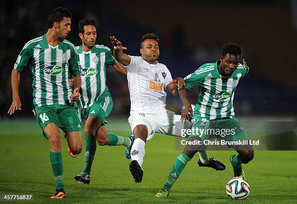 Kouko Guehi of Raja Casablanca fouls Fernandinho of Atletico Mineiro during the FIFA Club World Cup Semi Final match between Raja Casablanca and...