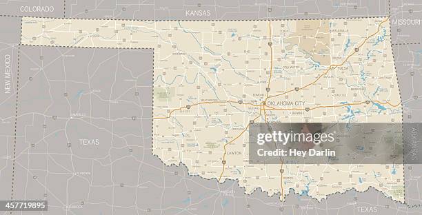a segmented map of oklahoma next to texas - muskogee oklahoma stock illustrations
