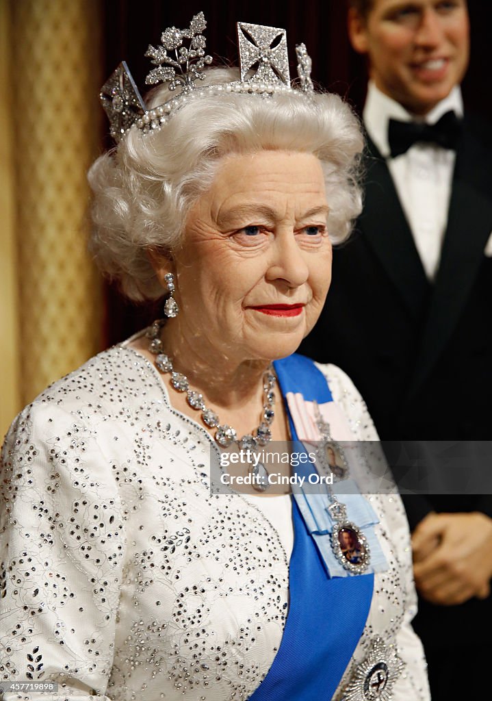 Wax Figures Of Queen Elizabeth And Prince Harry Make Debut At Madame Tussauds New York