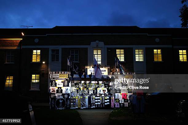 Vendor selling merchandise stands at a stall outside the stadium before the UEFA Europa League group C match between Tottenham Hotspur FC and Asteras...