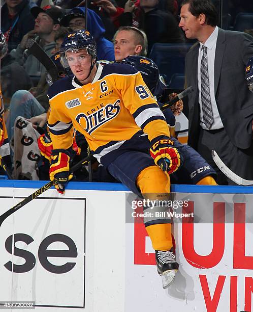 Connor McDavid of the Erie Otters climbs off the bench in an OHL hockey game against the Niagara IceDogs at the First Niagara Center on October 22,...