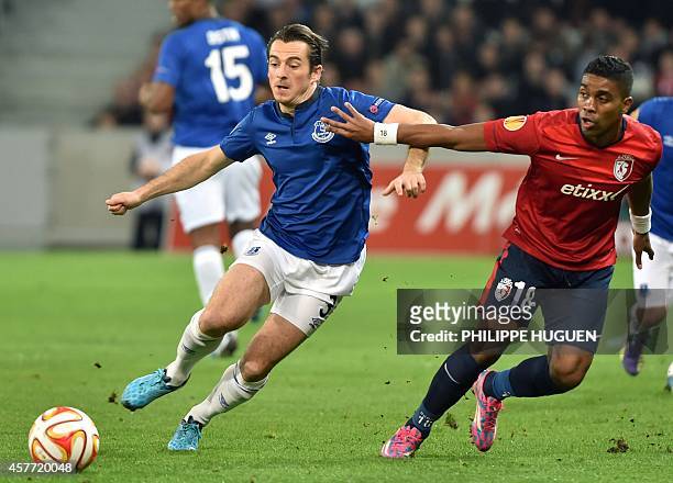 Lille's French defender Franck Beria vies for the ball with Everton's British defender Leighton Baines during the UEFA Europa League Group H football...