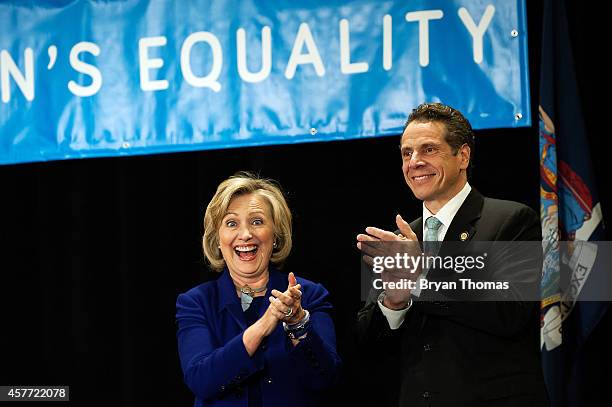 Former U.S. Secretary of State and U.S. Sen. Hillary Rodham Clinton and incumbent New York Governor Andrew Cuomo applaud during a "Women for Cuomo"...