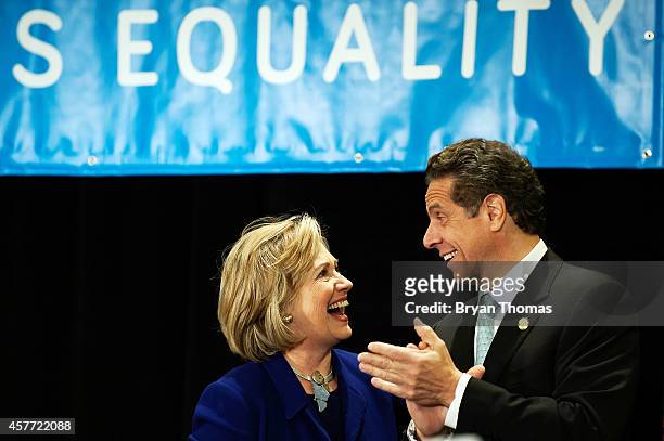 Former U.S. Secretary of State and U.S. Sen. Hillary Rodham Clinton and incumbent New York Governor Andrew Cuomo laugh during a "Women for Cuomo"...