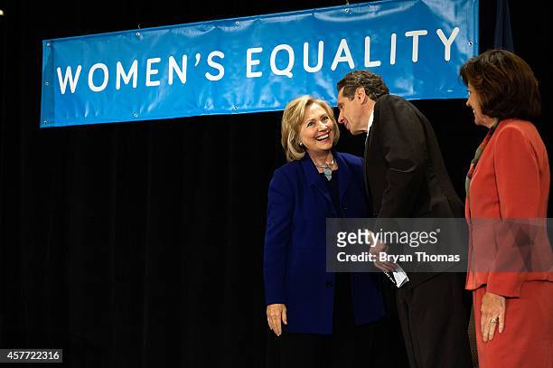 Former U.S. Secretary of State and U.S. Sen. Hillary Rodham Clinton and incumbent New York Governor Andrew Cuomo talk during a "Women for Cuomo"...