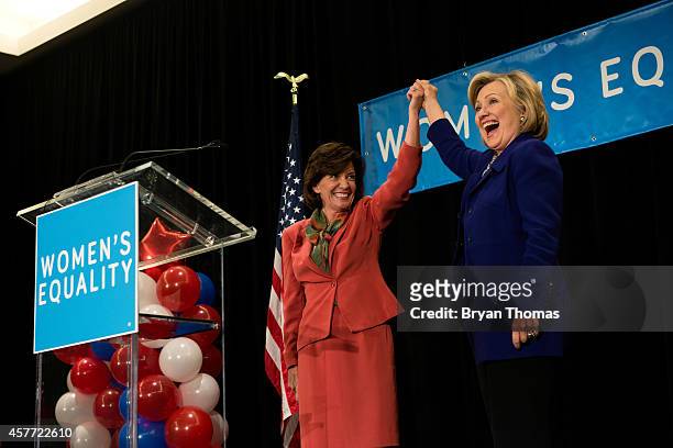 Rep. Kathy Hochul , the Democratic nominee for New York Lt. Gov., raises the hand of Former U.S. Secretary of State and U.S. Sen. Hillary Rodham...