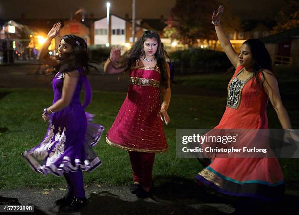 Dance troop rehearse their moves as they celebrate the Hindu festival of Diwali on October 23, 2014 in Leicester, England. Up to 35,000 people...