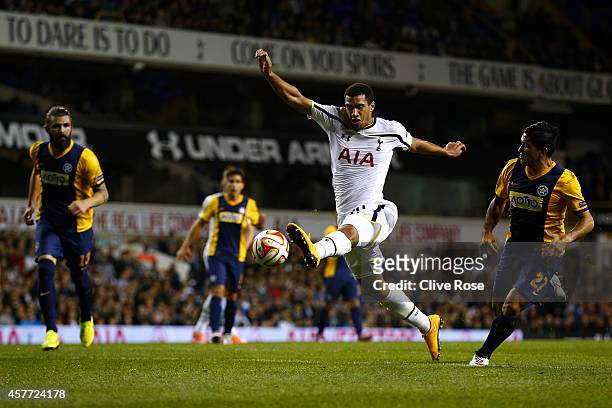 Etienne Capoue of Spurs controls the ball next to Braian Lluy of Asteras Tripolis FC during the UEFA Europa League group C match between Tottenham...