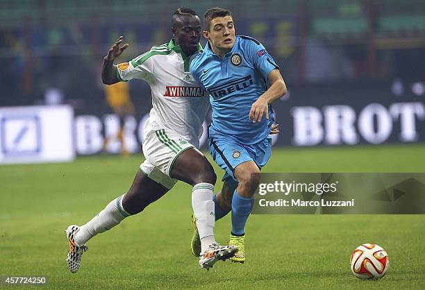 Mateo Kovacic of FC Internazionale Milano competes for the ball with Ismael Diomande of AS Saint-Etienne during the UEFA Europa League group F match...