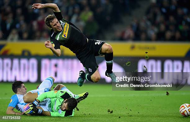 Max Kruse of Borussia Moenchengladbach is challenged by Angelis Angelis and Bruno Vale of Apollon Limassol FC during the UEFA Europa League group...
