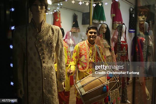 Bhangra drummer on the Golden Mile entertains the crowds as they celebrate the Hindu festival of Diwali on October 23, 2014 in Leicester, England. Up...