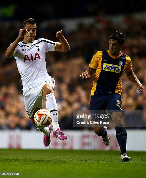 Erik Lamela of Spurs battles for the ball with Braian Lluy of Asteras Tripolis FC during the UEFA Europa League group C match between Tottenham...