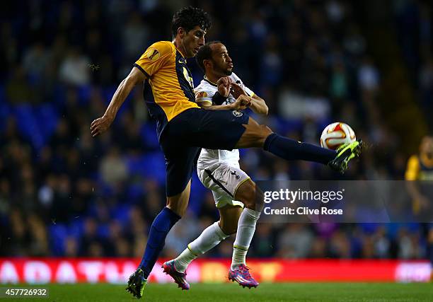 Andros Townsend of Spurs battles for the ball with Thanasis Panteliadis of Asteras Tripolis FC during the UEFA Europa League group C match between...