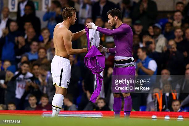 Hugo Lloris of Spurs swaps shirts with team-mate Harry Kane of Spurs after he was sent off leaving Harry Kane to take care of goalkeeping duties...