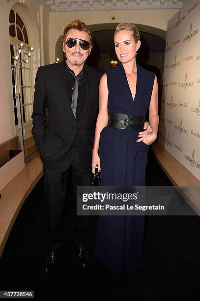 Laeticia and Johnny Hallyday attend the launch of the De Grisogono "Crazy Skull" watch on October 23, 2014 in Paris, France.