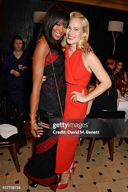 Naomi Campbell and Charlotte Olympia Dellal attend the Charlotte Olympia 'Handbags for the Leading Lady' launch dinner at Toto's Restaurant on...