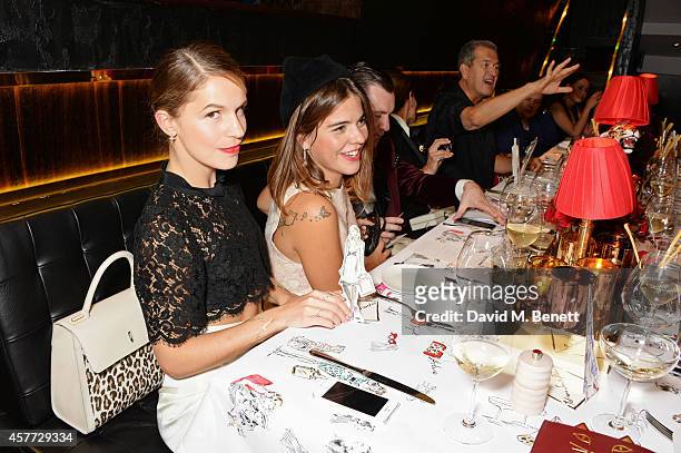 Eugenie Niarchos, Alix Duvernoy and Mario Testino attend the Charlotte Olympia 'Handbags for the Leading Lady' launch dinner at Toto's Restaurant on...