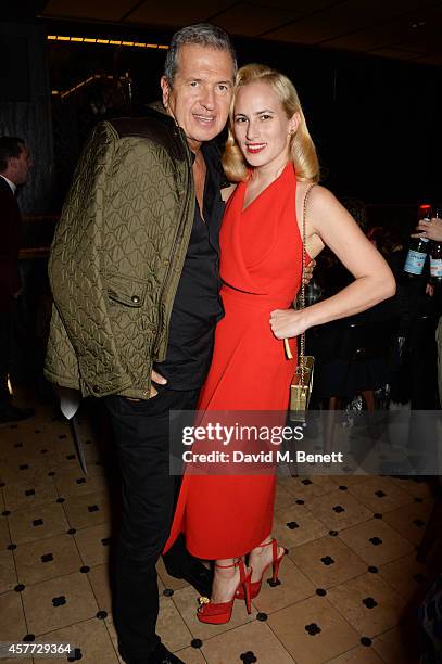 Mario Testino and Charlotte Olympia Dellal attend the Charlotte Olympia 'Handbags for the Leading Lady' launch dinner at Toto's Restaurant on October...