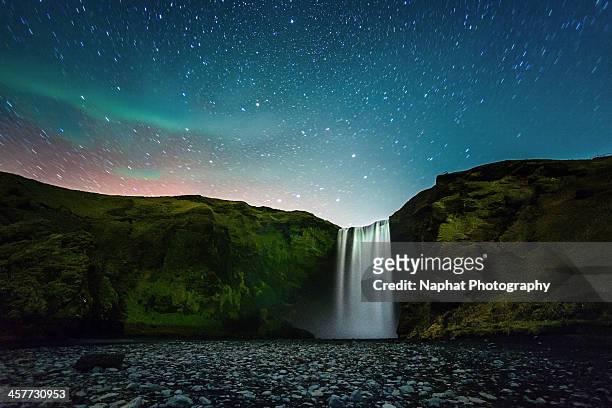 night at skógafoss - skogafoss waterfall stock pictures, royalty-free photos & images