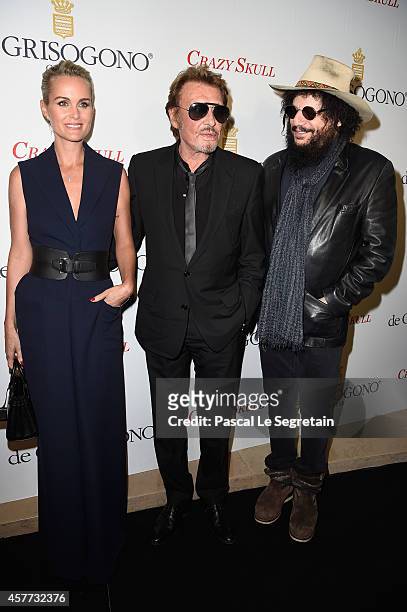 Laeticia Hallyday, Johnny Hallyday and Don Was attend the launch of the De Grisogono "Crazy Skull" watch on October 23, 2014 in Paris, France.