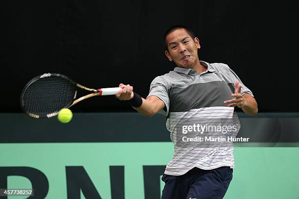 Tsung-Hua Yang of Chinese Taipaei in action against Rubin Statham of New Zealand in his match during day one of the Davis Cup tie between New Zealand...