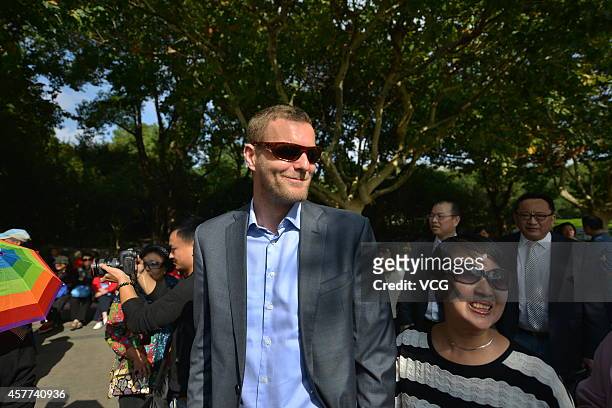 Dutch artist Florentijn Hofman, "Father of Rubber Duck" talks with citizens at Century Park on October 23, 2014 in Shanghai, China. "Rubber Duck",...