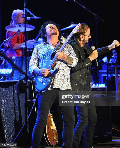 Steve Lukather and Ringo Starr of Ringo Starr & His All-Starr Band perform at Ruth Eckerd Hall on October 23, 2014 in Clearwater, Florida.