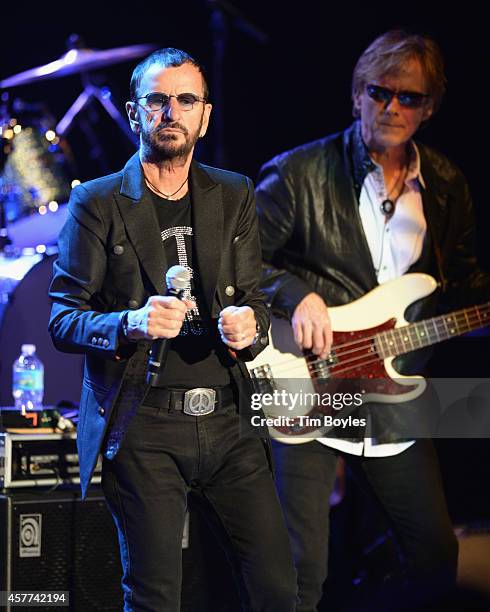 Ringo Starr and Richard Page of Ringo Starr & His All-Starr Band perform at Ruth Eckerd Hall on October 23, 2014 in Clearwater, Florida.