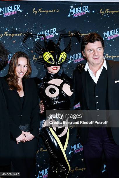 Actors Vanessa Demouy and husband Philippe Lellouche attend the "Mugler Follies" Paris new variety show premiere on December 18 held at 'Le Comedia'...