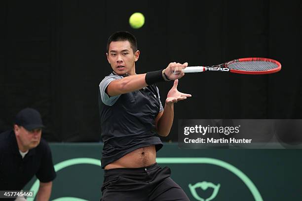 Chieh-Fu Wang of Chinese Taipaei in action against Michael Venus of New Zealand in his match during day one of the Davis Cup tie between New Zealand...