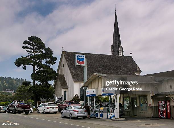 Chevron gas station is located next to a Presbyterian church as viewed on September 6 near Mendocino, California. This small Northern California...