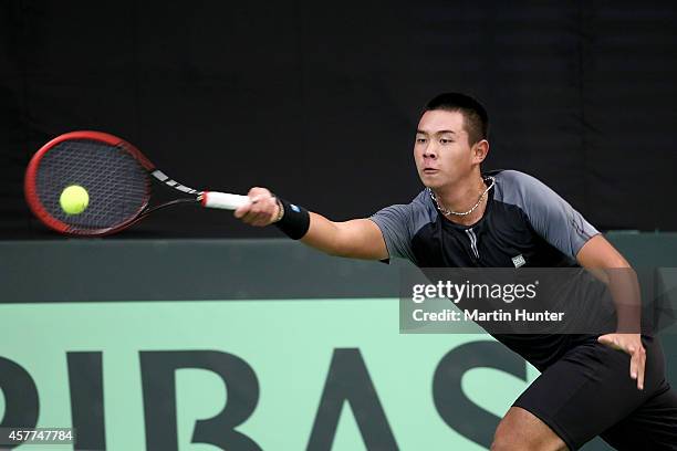 Chieh-Fu Wang of Chinese Taipaei in action against Michael Venus of New Zealand in his match during day one of the Davis Cup tie between New Zealand...