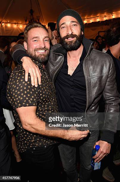 Actor Adrien Brody and photorgrapher Brian Bowen Smith attend the Brian Bowen Smith WILDLIFE show hosted by Casamigos Tequila at De Re Gallery on...