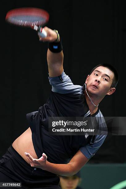 Chieh-Fu Wang of Chinese Taipaei in action against Michael Venus of New Zealand in his match during day one of the Davis Cup tie between New Zealand...