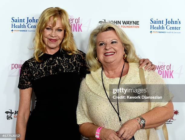 Actress Melanie Griffith and Rosemary Hygate, a cancer survivor, attend Power of Pink 2014 Benefiting the Cancer Prevention Program at Saint John's...