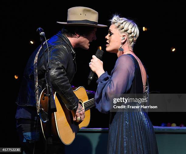 Musicians Butch Walker and Pink perform at Power of Pink 2014 Benefiting the Cancer Prevention Program at Saint John's Health Center at House of...