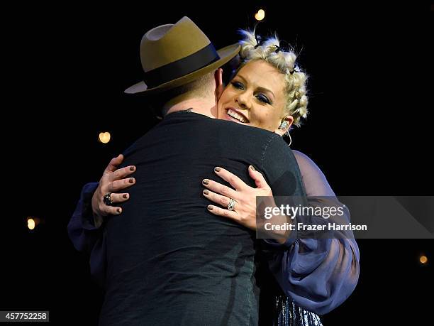 Musicians Matthew Kelly and Pink perform onstage at Power of Pink 2014 Benefiting the Cancer Prevention Program at Saint John's Health Center at...