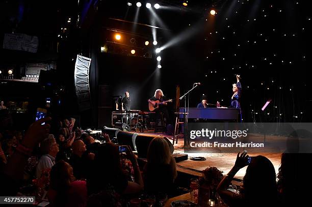 Musicians Justin Derrico, Linda Perry and Pink perform onstage during the Power of Pink 2014 Benefiting the Cancer Prevention Program at Saint John's...