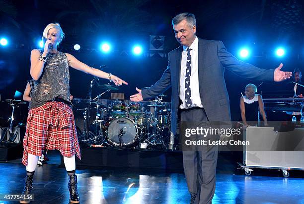 Singer Gwen Stefani and honoree Eddy Cue onstage during the City of Hope Spirit of Life Gala honoring Apple's Eddy Cue at the Pacific Design Center...